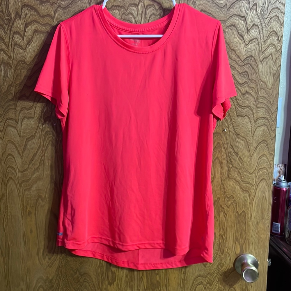 A neon pink athletic shirt